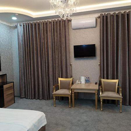 Diyor Hotel Marghilon Exterior foto