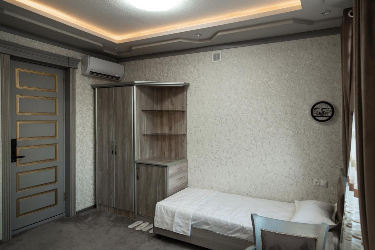 Diyor Hotel Marghilon Exterior foto