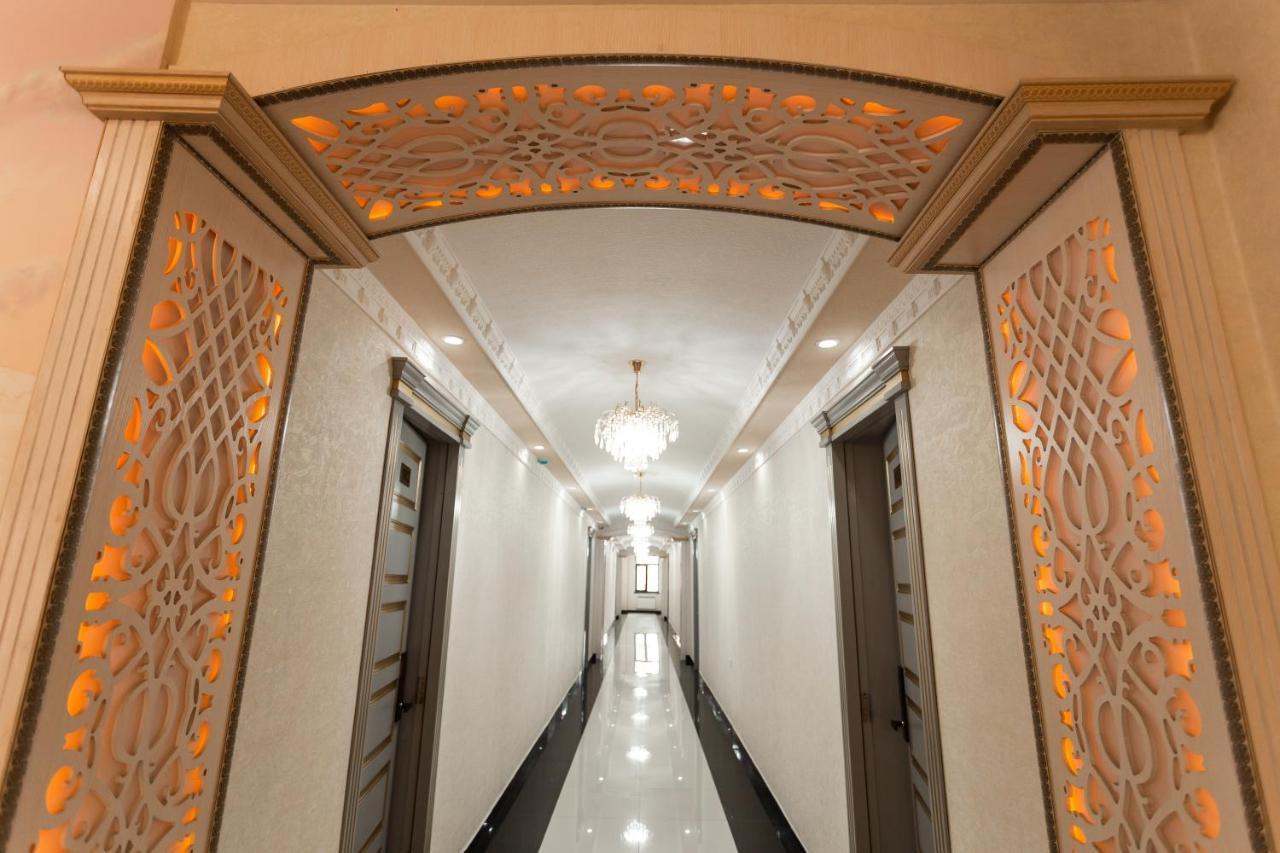 Diyor Hotel Marghilon Exterior foto