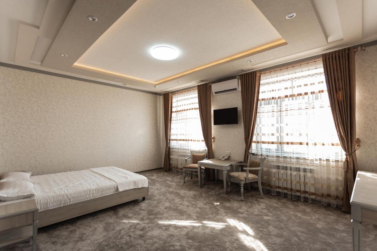 Diyor Hotel Marghilon Exterior foto