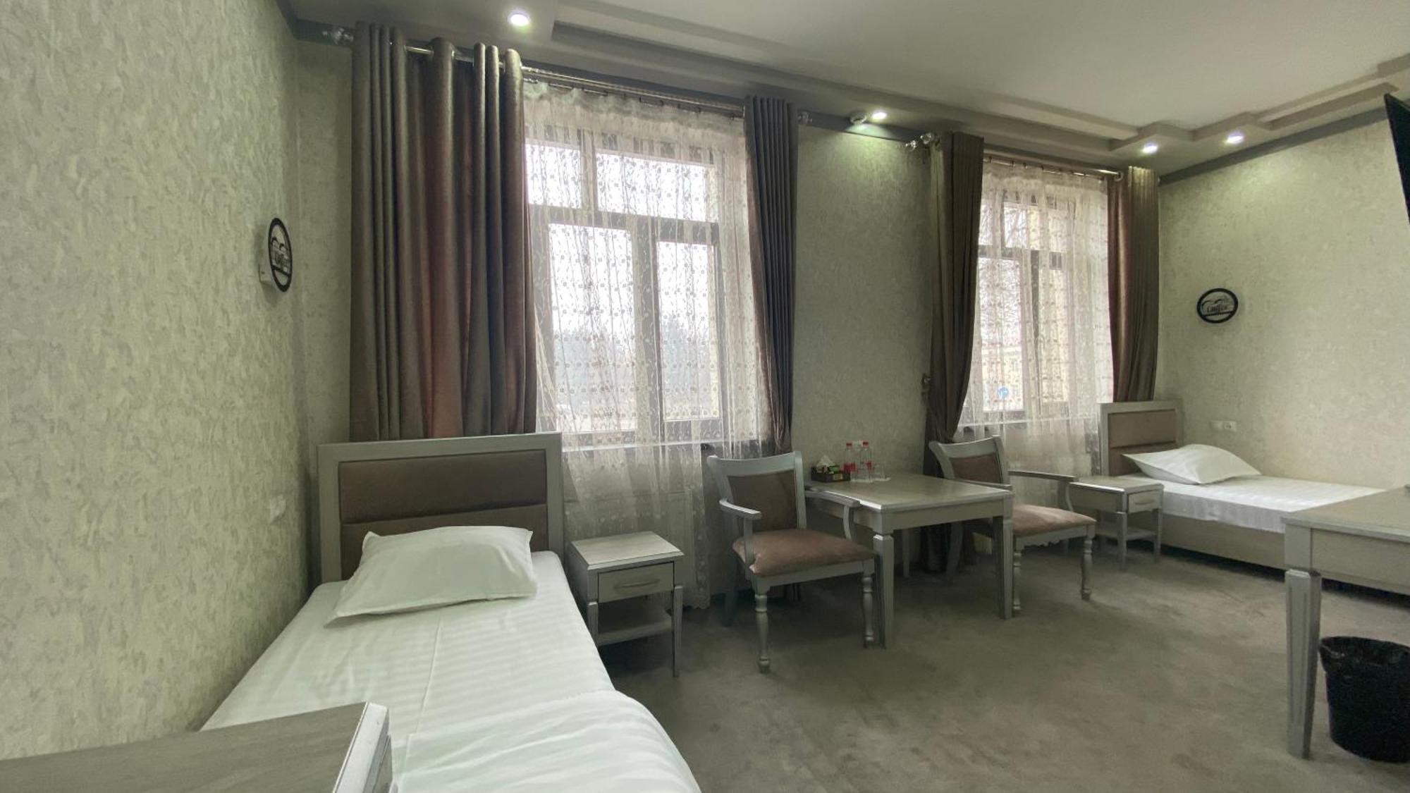 Diyor Hotel Marghilon Exterior foto