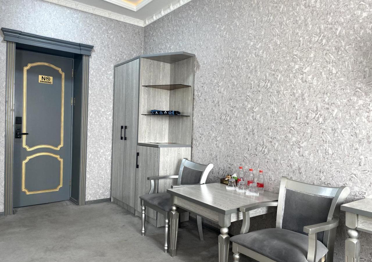 Diyor Hotel Marghilon Exterior foto