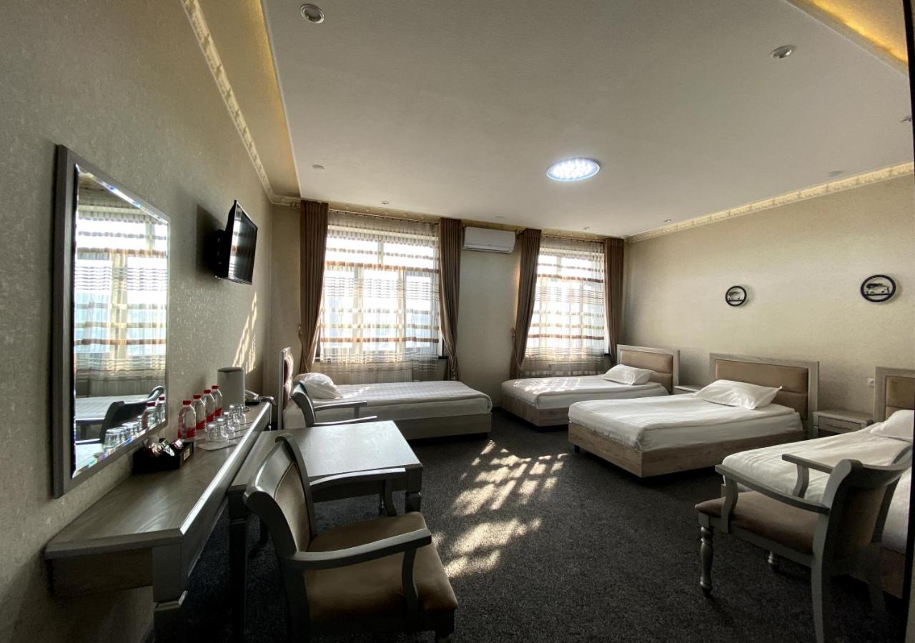 Diyor Hotel Marghilon Exterior foto