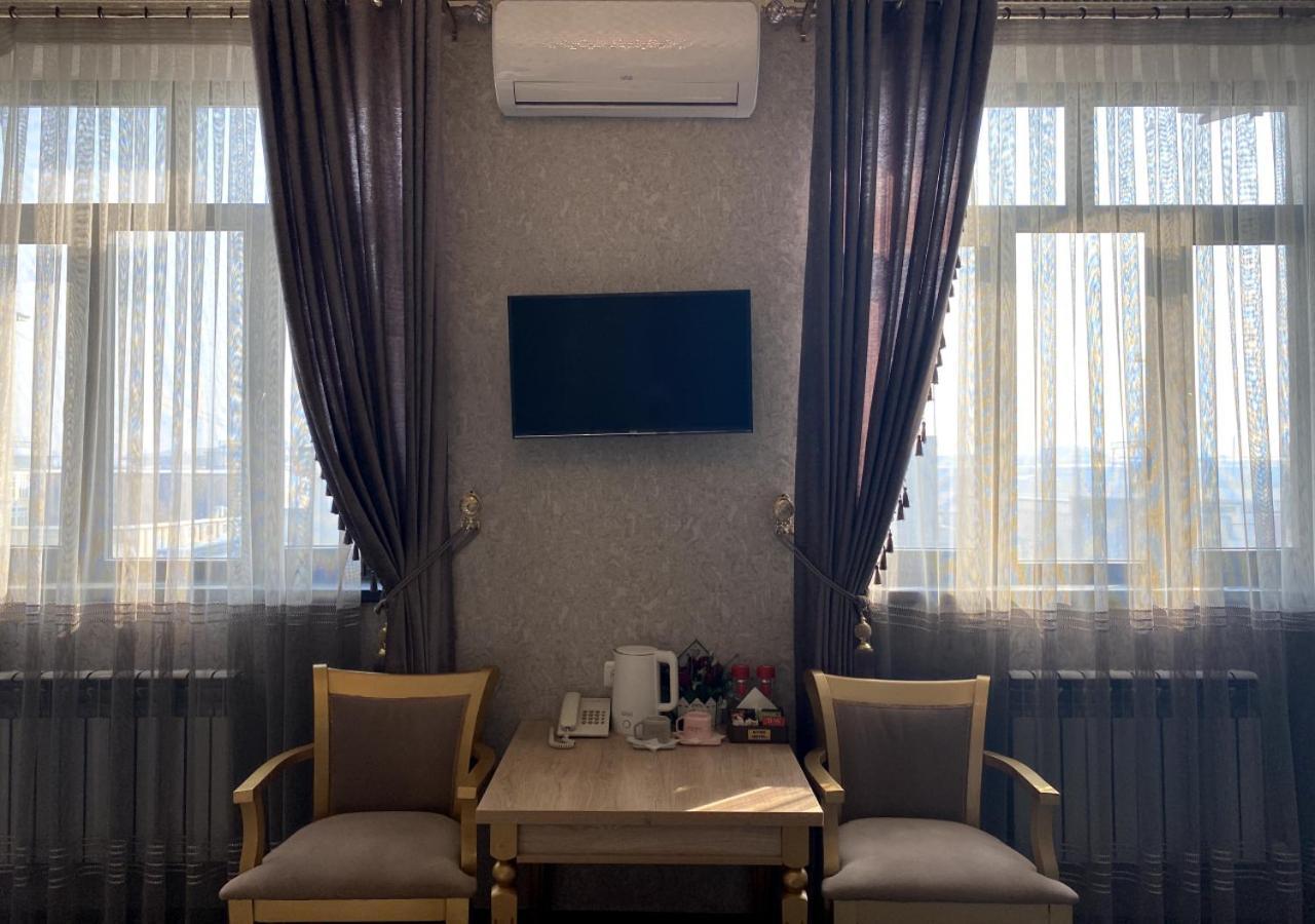 Diyor Hotel Marghilon Exterior foto