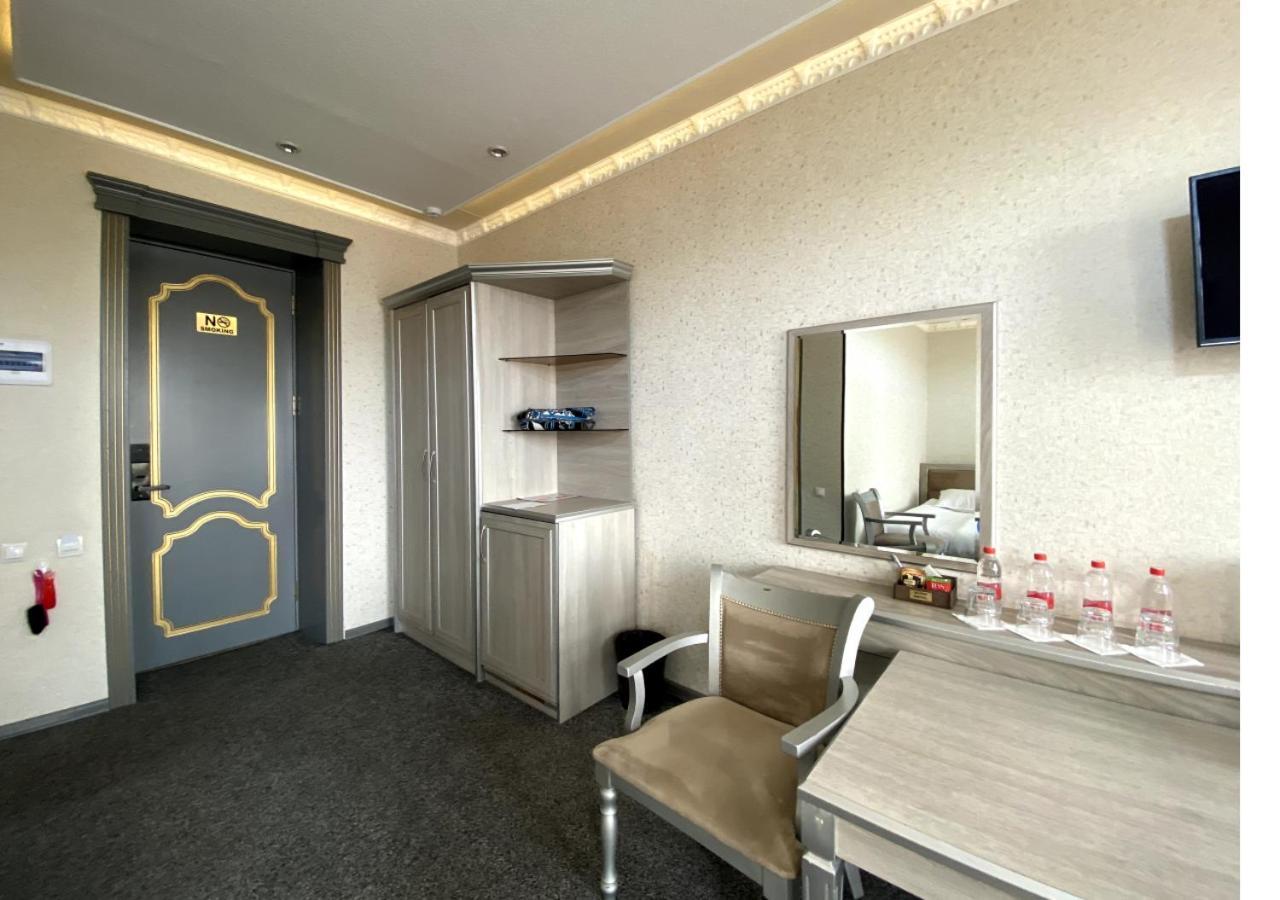 Diyor Hotel Marghilon Exterior foto