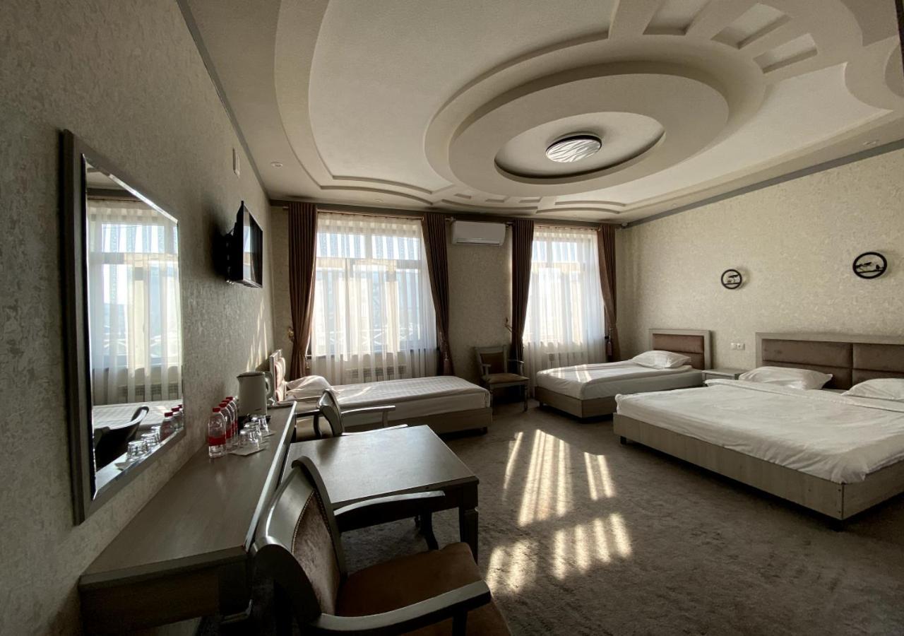 Diyor Hotel Marghilon Exterior foto