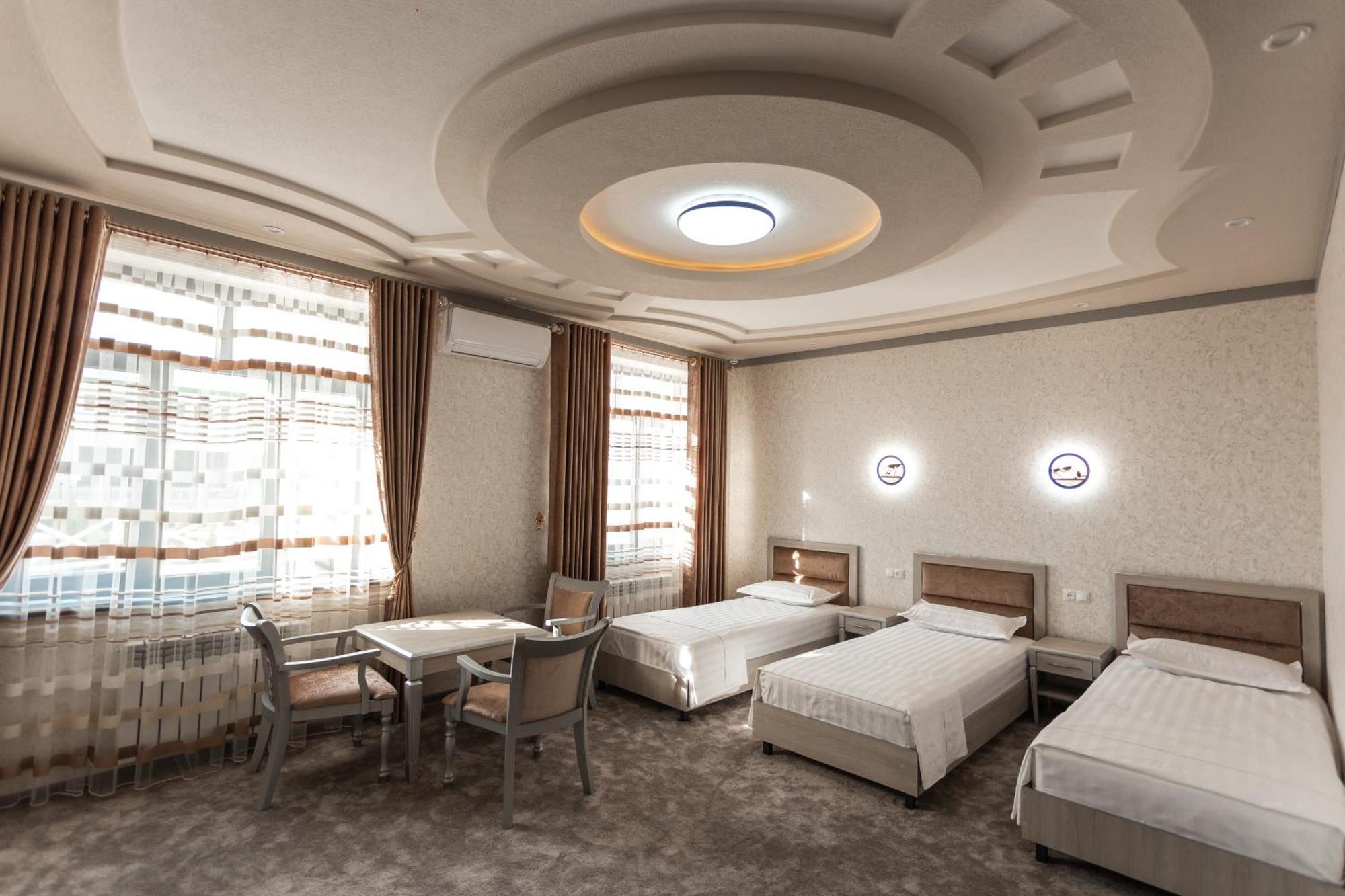 Diyor Hotel Marghilon Exterior foto