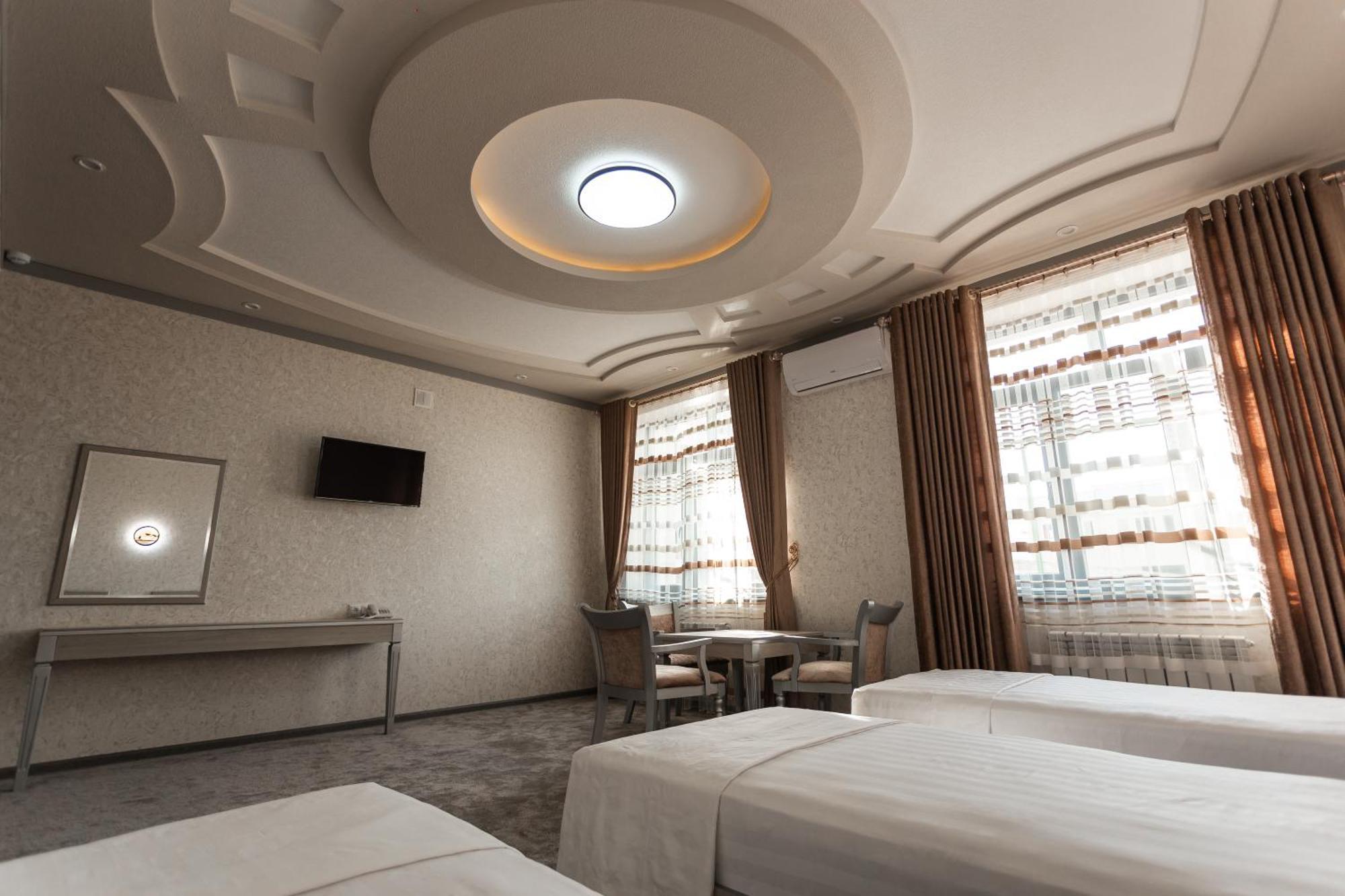 Diyor Hotel Marghilon Exterior foto