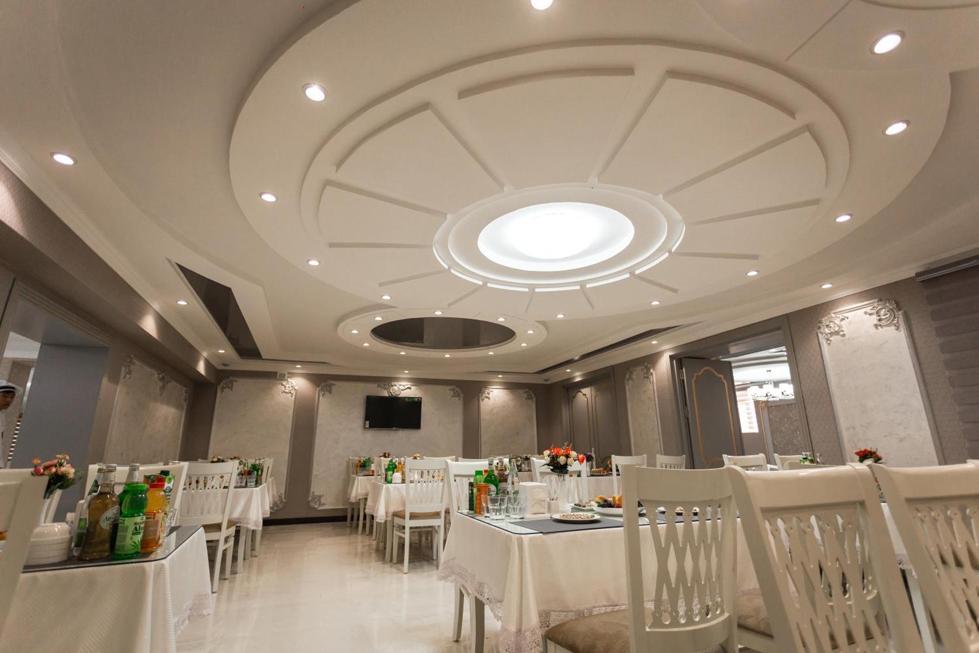 Diyor Hotel Marghilon Exterior foto